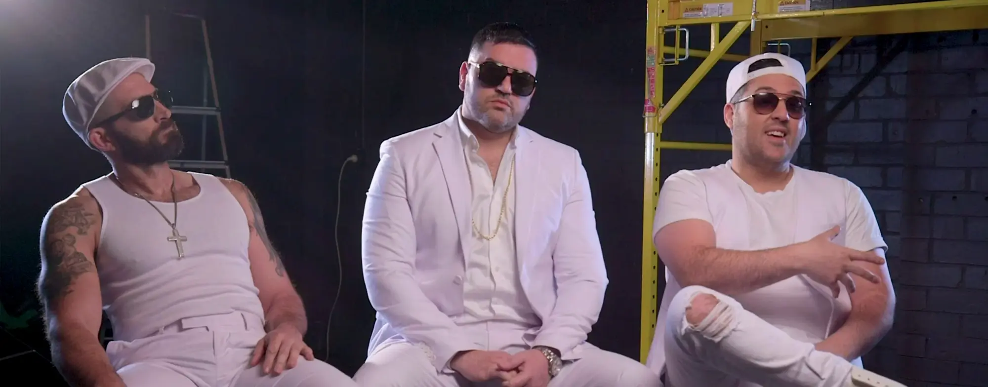 Sooshi Mango cast in white suits, photographed by DCF Studios
