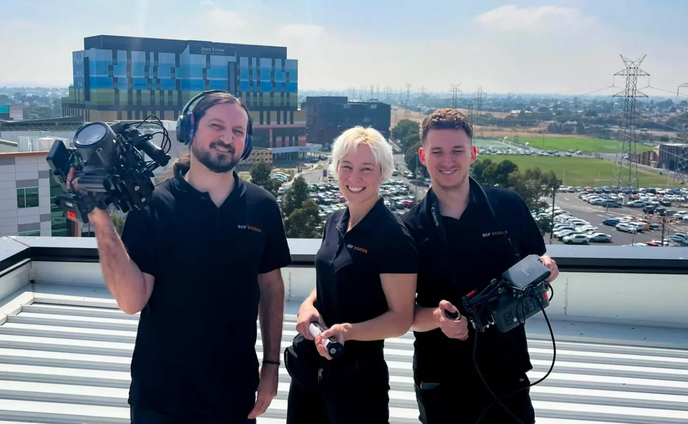 The DCF Studios crew with cameras on a rooftop shoot